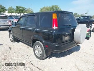 1998 Honda CR-V LX with VIN JHLRD2846WC018947, listed as a IAAI auction lot 41912066 with 112,454 mi miles. Bid and sale history available at carsss.com. Image 3.