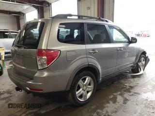 2009 Subaru Forester X with VIN JF2SH63619H731296, listed as a IAAI auction lot 42294036 with 184,739 mi miles and . Bid and sale history available at DreamBid. Image 4.