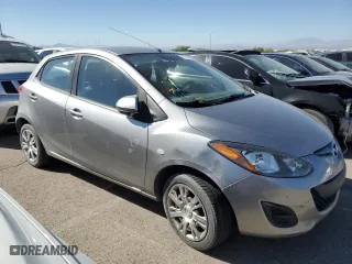 2012 Mazda Mazda2 Sport with VIN JM1DE1KZXC0152070, listed as a Copart auction lot 71793854 with 127,833 mi miles and Salvage Title. Bid and sale history available at carsss.com. Image 4.