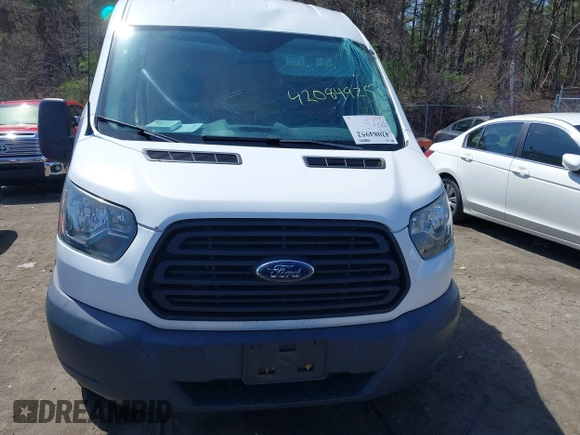 2015 Ford Transit Cargo z VIN 1FTNR2CM8FKB24259, wystawiony jako IAAI lot #42084952 z przebiegiem 124 520 mil mil oraz . Historia ofert i sprzedaży dostępna na DreamBid. Obrazek 12.