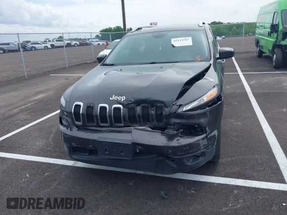 2015 Jeep Cherokee Latitude with VIN 1C4PJLCB5FW689811, listed as a IAAI auction lot 42113567 with 113,740 mi miles and . Bid and sale history available at carsss.com. Image 12.