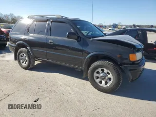 1999 Isuzu Rodeo S with VIN 4S2CK58W2X4336401, listed as a Copart auction lot 83872484 with 191,278 mi miles and Salvage title. Bid and sale history available at DreamBid. Image 4.