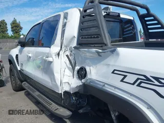 2021 Ram 1500 TRX with VIN 1C6SRFU9XMN905260, listed as a IAAI auction lot 41745910 with 69,565 mi miles and . Bid and sale history available at DreamBid. Image 17.