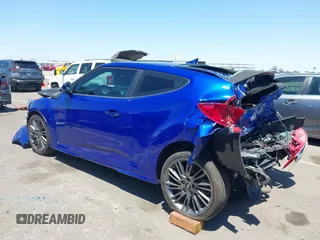 2013 Hyundai Veloster w/Gray Int z VIN KMHTC6AD3DU134956, wystawiony jako IAAI lot #42560944 z przebiegiem 108 166 mil mil oraz . Historia ofert i sprzedaży dostępna na DreamBid. Obrazek 3.