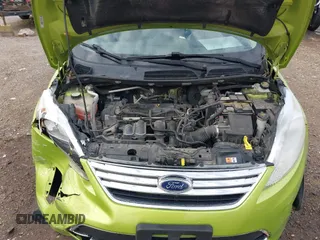 2013 Ford Fiesta SE z VIN 3FADP4BJ9DM184289, wystawiony jako IAAI lot #42110578 z przebiegiem 166 764 mil mil oraz . Historia ofert i sprzedaży dostępna na DreamBid. Obrazek 10.