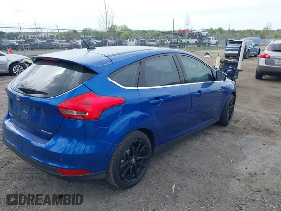 2018 Ford Focus Titanium z VIN 1FADP3N26JL325931, wystawiony jako IAAI lot #42096503 z przebiegiem 106 338 mil mil oraz . Historia ofert i sprzedaży dostępna na DreamBid. Obrazek 4.