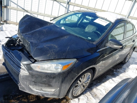2015 Ford Focus Titanium with VIN 1FADP3J22FL323185, listed as a IAAI auction lot 41461154 with 125,477 mi miles and . Bid and sale history available at carsss.com. Image 2.