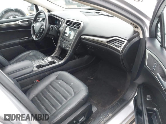 2017 Ford Fusion Energi SE with VIN 3FA6P0PU9HR354096, listed as a IAAI auction lot 42064703 with 69,601 mi miles. Bid and sale history available at carsss.com. Image 5.