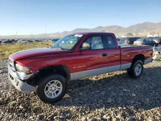 1998 Dodge Dakota SLT with VIN 1B7GG22Y6WS584989, listed as a Copart auction lot 77398674 with 171,923 mi miles and Salvage Title. Bid and sale history available at carsss.com. Image 1.