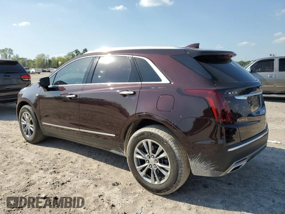 2021 Cadillac XT5 FWD Premium Luxury with VIN 1GYKNCRS2MZ180884, listed as a Copart auction lot 50433445 with 27,246 mi miles and Salvage Title. Bid and sale history available at carsss.com. Image 2.