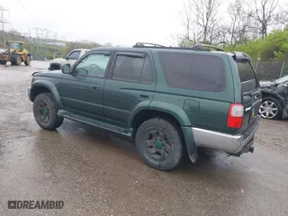2000 Toyota 4Runner SR5 with VIN JT3HN86R9Y0294975, listed as a IAAI auction lot 41985007 with 218,761 mi miles. Bid and sale history available at carsss.com. Image 3.