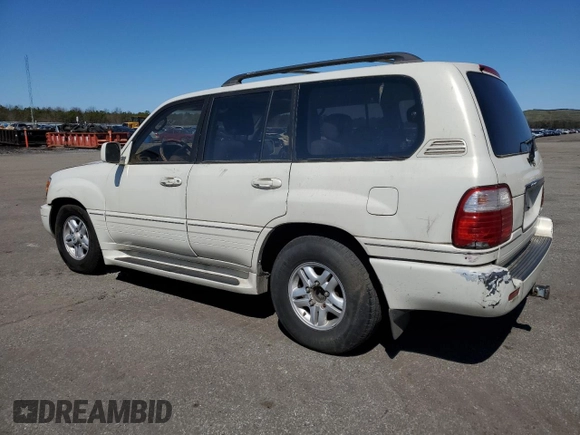 2000 Lexus LX 470 z VIN JT6HT00W1Y0096061, wystawiony jako Copart lot #52499155 z przebiegiem 199 914 mil mil oraz Tytuł czysty. Historia ofert i sprzedaży dostępna na DreamBid. Obrazek 2.