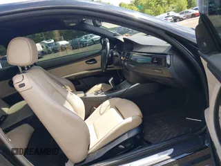 2011 BMW 3 Series 335i xDrive with VIN WBAKF9C56BE247125, listed as a IAAI auction lot 39738395 with 144,405 mi miles. Bid and sale history available at carsss.com. Image 5.