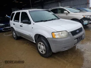 2001 Ford Escape XLS with VIN 1FMYU01191KA29996, listed as a Copart auction lot 86362534 with 265,271 mi miles and Salvage title. Bid and sale history available at DreamBid. Image 4.