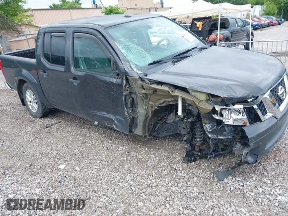 2015 Nissan Frontier SL with VIN 1N6AD0EV1FN764719, listed as a IAAI auction lot 42512771 with 104,572 mi miles and . Bid and sale history available at DreamBid. Image 6.