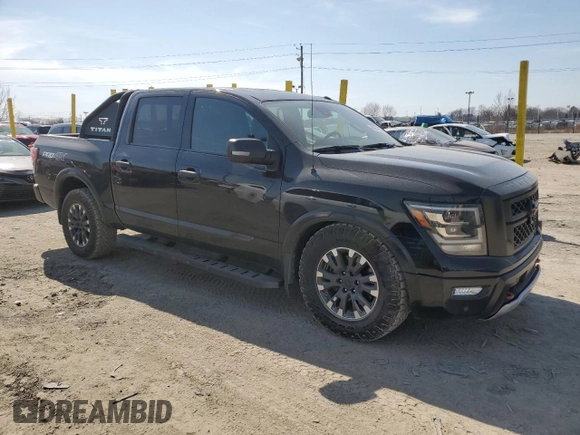 2020 Nissan Titan SL with VIN 1N6AA1ED1LN500028, listed as a Copart auction lot 48961155 with 50,088 mi miles and Salvage title. Bid and sale history available at DreamBid. Image 4.