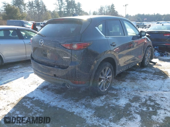 2020 Mazda CX-5 Grand Touring with VIN JM3KFBDM7L1807685, listed as a IAAI auction lot 41392313 with 91,729 mi miles and . Bid and sale history available at carsss.com. Image 4.