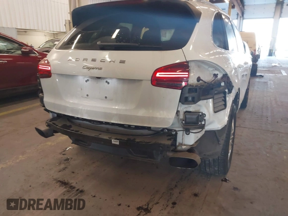 2016 Porsche Cayenne with VIN WP1AA2A26GLA10357, listed as a IAAI auction lot 41370956 with 96,026 mi miles. Bid and sale history available at carsss.com. Image 21.