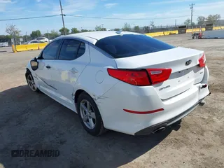 2014 Kia Optima LX with VIN 5XXGM4A70EG307809, listed as a IAAI auction lot 42023169 with 127,617 mi miles. Bid and sale history available at carsss.com. Image 3.