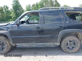 2003 Chevrolet Tahoe Z71 with VIN 1GNEK13ZX3R283921, listed as a IAAI auction lot 42347317 with 224,885 mi miles and . Bid and sale history available at DreamBid. Image 14.