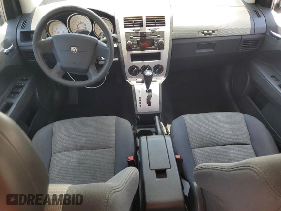 2009 Dodge Caliber SXT with VIN 1B3HB48A49D142621, listed as a Copart auction lot 55934095 with 158,885 mi miles and Non Repairable. Bid and sale history available at DreamBid. Image 8.