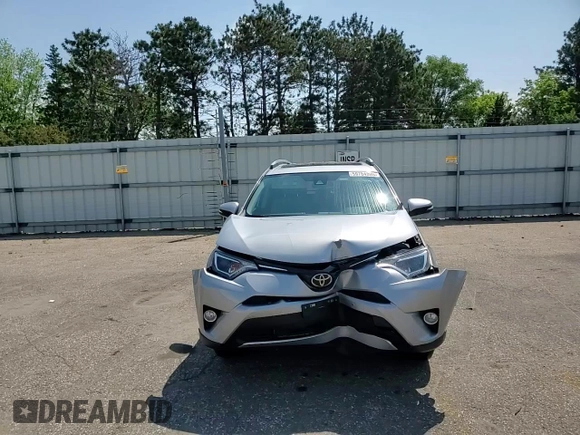 2016 Toyota RAV4 XLE with VIN 2T3RFREV9GW463274, listed as a Copart auction lot 59784805 with 99,138 mi miles and Salvage title. Bid and sale history available at DreamBid. Image 14.
