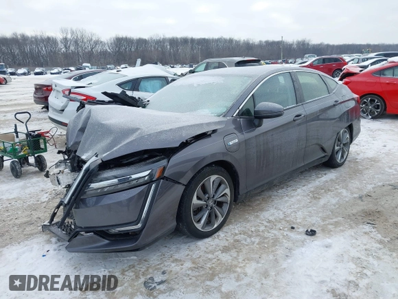 2018 Honda Clarity z VIN JHMZC5F13JC006627, wystawiony jako IAAI lot #41335364 z przebiegiem 58 662 mil mil oraz . Historia ofert i sprzedaży dostępna na DreamBid. Obrazek 17.