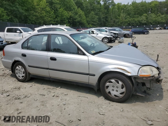 1997 Honda Civic LX z VIN 2HGEJ6677VH573069, wystawiony jako Copart lot #59739065 z przebiegiem 287 987 mil mil oraz Szkoda całkowita • Salvage title. Historia ofert i sprzedaży dostępna na DreamBid. Obrazek 4.