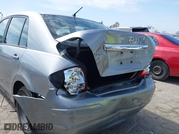 2011 Nissan Versa 1.8 S with VIN 3N1BC1AP0BL423655, listed as a IAAI auction lot 41816518 with 89,862 mi miles. Bid and sale history available at carsss.com. Image 6.