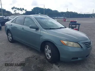 2007 Toyota Camry CE with VIN 4T1BE46K37U569515, listed as a IAAI auction lot 41974482 with 242,042 mi miles. Bid and sale history available at carsss.com. Image 1.