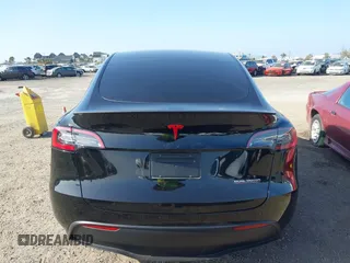 2023 Tesla Model Y Performance with VIN 7SAYGDEF4PF809308, listed as a IAAI auction lot 42056769 with 12,101 mi miles and . Bid and sale history available at DreamBid. Image 15.