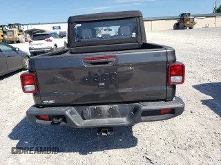 2021 Jeep Gladiator Freedom с VIN 1C6HJTAG4ML580023, выставлен на аукционе Copart как лот 57586475 с пробегом 64 022 миль миль и Списание • Salvage title. История ставок и продаж доступна на DreamBid. Изображение 6.