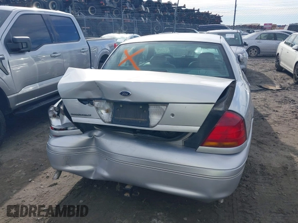 2002 Ford Crown Victoria LX z VIN 2FAFP74W42X100691, wystawiony jako IAAI lot #41316550 z przebiegiem 193 517 mil mil oraz . Historia ofert i sprzedaży dostępna na DreamBid. Obrazek 15.