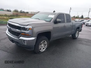 2017 Chevrolet Silverado 1500 LT with VIN 1GCRCRECXHZ159962, listed as a IAAI auction lot 41634689 with 145,978 mi miles and . Bid and sale history available at DreamBid. Image 2.