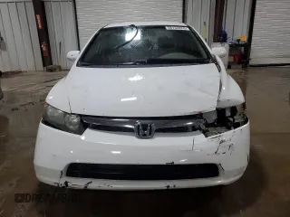 2006 Honda Civic LX z VIN 1HGFA16556L113760, wystawiony jako Copart lot #58132265 z przebiegiem 193 592 mil mil oraz Szkoda całkowita • Salvage title. Historia ofert i sprzedaży dostępna na DreamBid. Obrazek 5.