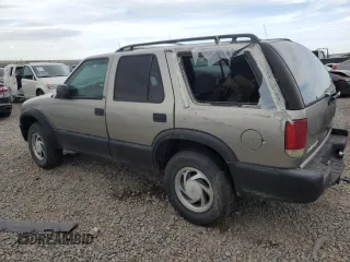 1999 Chevrolet Blazer Trailblazer z VIN 1GNDT13W9X2238417, wystawiony jako Copart lot #80087223 z przebiegiem Nie podano mil oraz Szkoda całkowita • Salvage title. Historia ofert i sprzedaży dostępna na DreamBid. Obrazek 2.