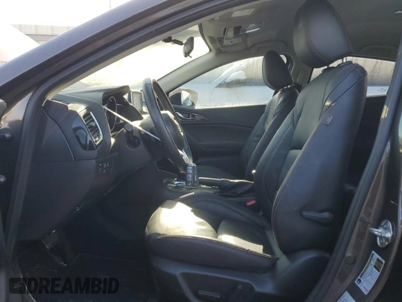 2014 Mazda 3 S Touring with VIN JM1BM1V34E1209913, listed as a Copart auction lot 42215975 with 140,083 mi miles and Salvage Title. Bid and sale history available at DreamBid. Image 7.