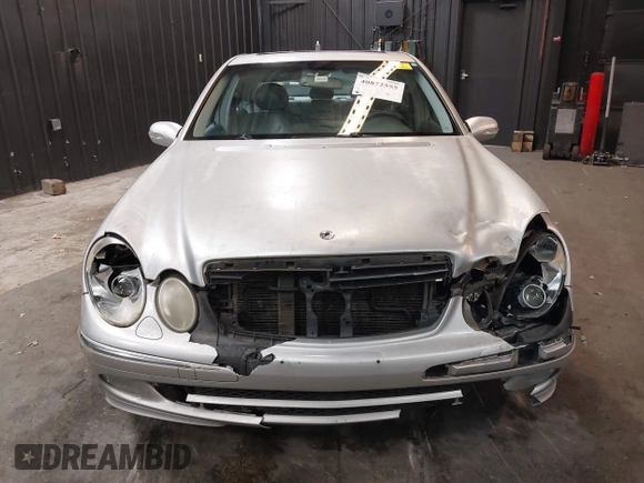 2003 Mercedes-Benz E 500 with VIN WDBUF70J03A101277, listed as a IAAI auction lot 40872555 with 330,553 mi miles and . Bid and sale history available at DreamBid. Image 6.