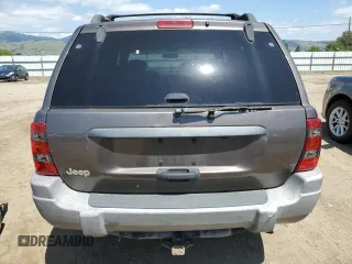 2000 Jeep Grand Cherokee Laredo with VIN 1J4G248S6YC333068, listed as a Copart auction lot 54972765 with 183,775 mi miles and Clean title. Bid and sale history available at DreamBid. Image 6.
