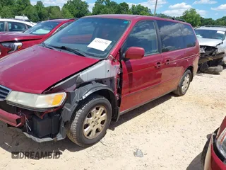 2003 Honda Odyssey EX with VIN 5FNRL18663B021888, listed as a IAAI auction lot 42343770 with 261,998 mi miles and . Bid and sale history available at DreamBid. Image 2.