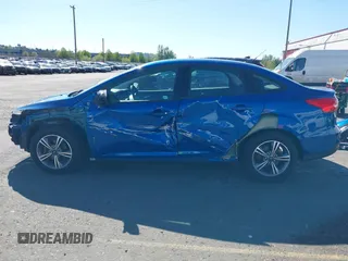 2018 Ford Focus SE z VIN 1FADP3FE4JL279265, wystawiony jako IAAI lot #42068130 z przebiegiem 43 616 mil mil oraz . Historia ofert i sprzedaży dostępna na DreamBid. Obrazek 15.