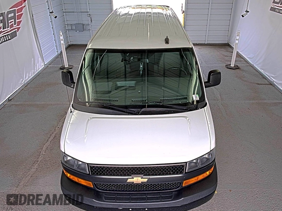 2021 Chevrolet Express Cargo z VIN 1GCWGAFP5M1201537, wystawiony jako IAAI lot #42642579 z przebiegiem 96 732 mil mil oraz . Historia ofert i sprzedaży dostępna na DreamBid. Obrazek 44.