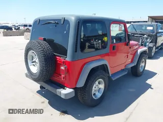 2001 Jeep Wrangler Sport with VIN 1J4FA49S11P375854, listed as a IAAI auction lot 42334037 with 215,027 mi miles and . Bid and sale history available at DreamBid. Image 4.