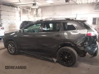 2019 Jeep Cherokee Latitude Plus with VIN 1C4PJMLB1KD139940, listed as a IAAI auction lot 41754134 with 113,237 mi miles. Bid and sale history available at carsss.com. Image 14.