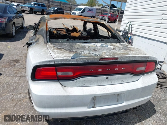 2014 Dodge Charger Police with VIN 2C3CDXAT0EH121251, listed as a IAAI auction lot 41940120 with Not Provided miles and . Bid and sale history available at DreamBid. Image 13.