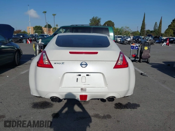 2014 Nissan 370Z Touring with VIN JN1AZ4EH7EM635655, listed as a IAAI auction lot 42217280 with 150,200 mi miles and . Bid and sale history available at DreamBid. Image 16.