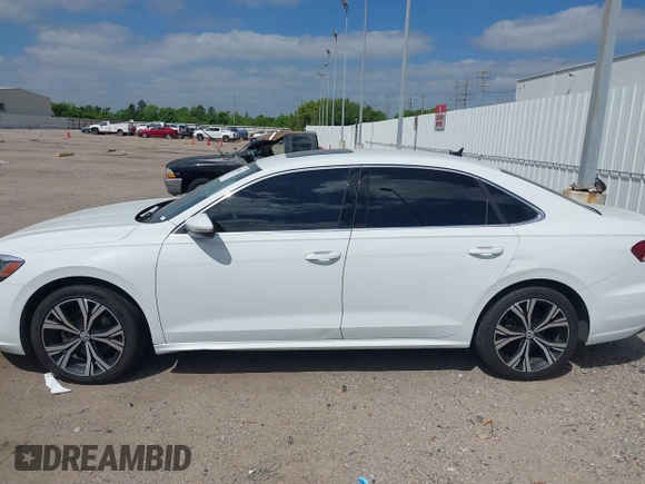 2021 Volkswagen Passat SE with VIN 1VWSA7A30MC000802, listed as a IAAI auction lot 42007087 with 190,171 mi miles and . Bid and sale history available at DreamBid. Image 14.