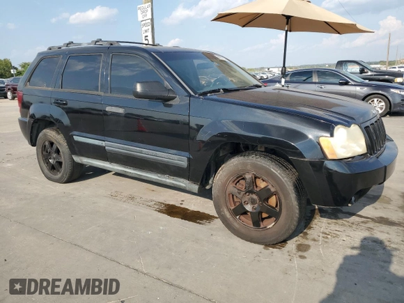 2008 Jeep Grand Cherokee Laredo with VIN 1J8GS48K98C140153, listed as a Copart auction lot 69035244 with 218,763 mi miles and Clean Title. Bid and sale history available at carsss.com. Image 4.