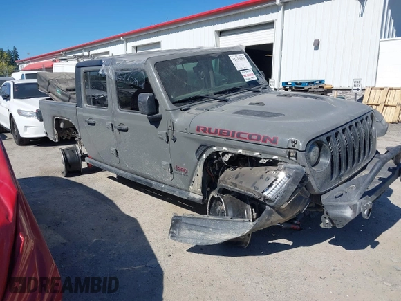 2023 Jeep Gladiator Rubicon with VIN 1C6JJTBG6PL538859, listed as a IAAI auction lot 42633055 with 22,899 mi miles and . Bid and sale history available at DreamBid. Image 1.