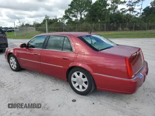 2006 Cadillac DTS 1SC z VIN 1G6KD57Y86U199826, wystawiony jako Copart lot #71582074 z przebiegiem 170 583 mil mil oraz Szkoda całkowita • Salvage title. Historia ofert i sprzedaży dostępna na DreamBid. Obrazek 2.